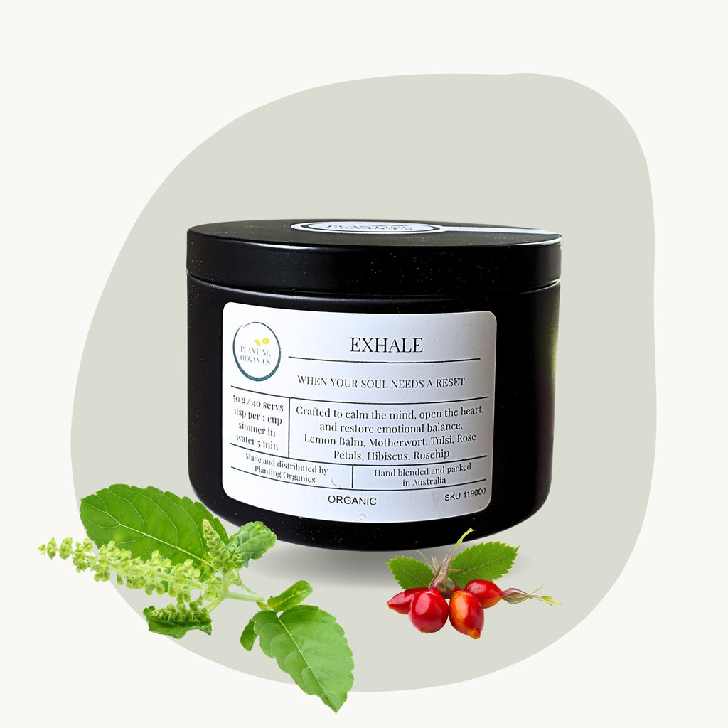 Exhale tea blend in a black tin packaging