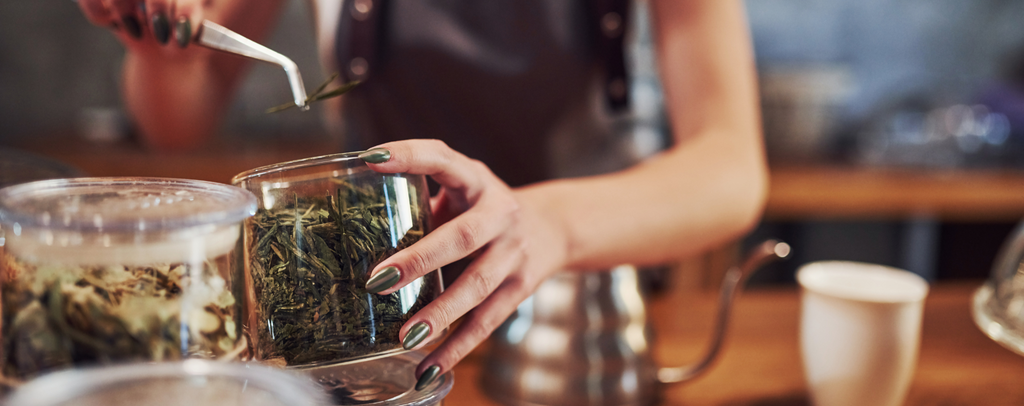 Herbalist Mixing Herbal Tea